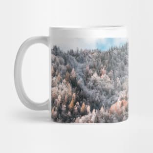 Colorful trees covered in snow Mug
